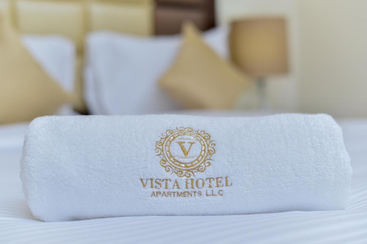Vista Hotel Apartments Deluxe ドバイ エクステリア 写真