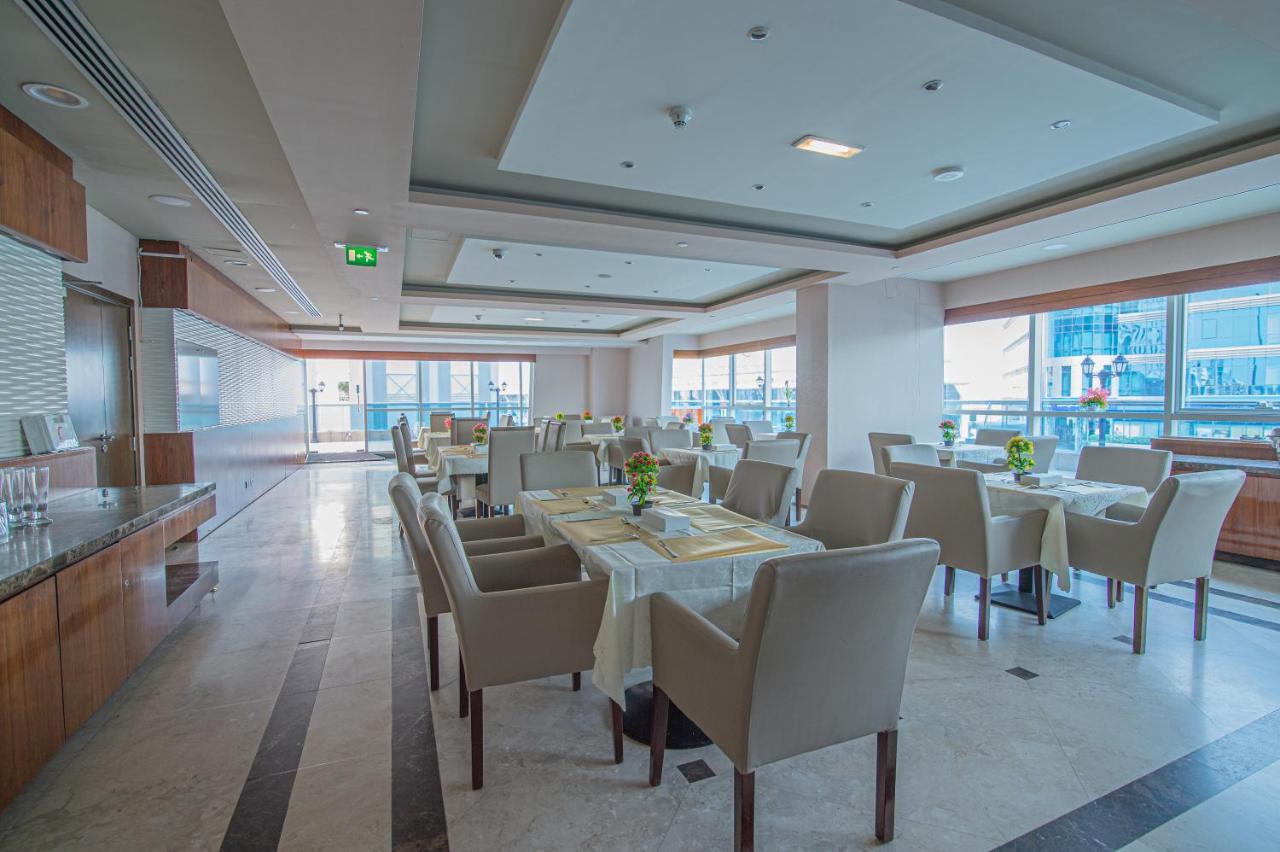 Vista Hotel Apartments Deluxe ドバイ エクステリア 写真