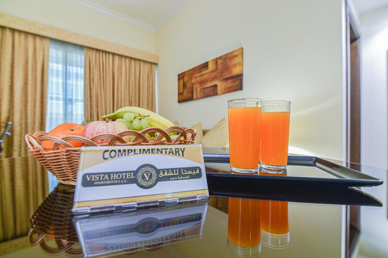 Vista Hotel Apartments Deluxe ドバイ エクステリア 写真