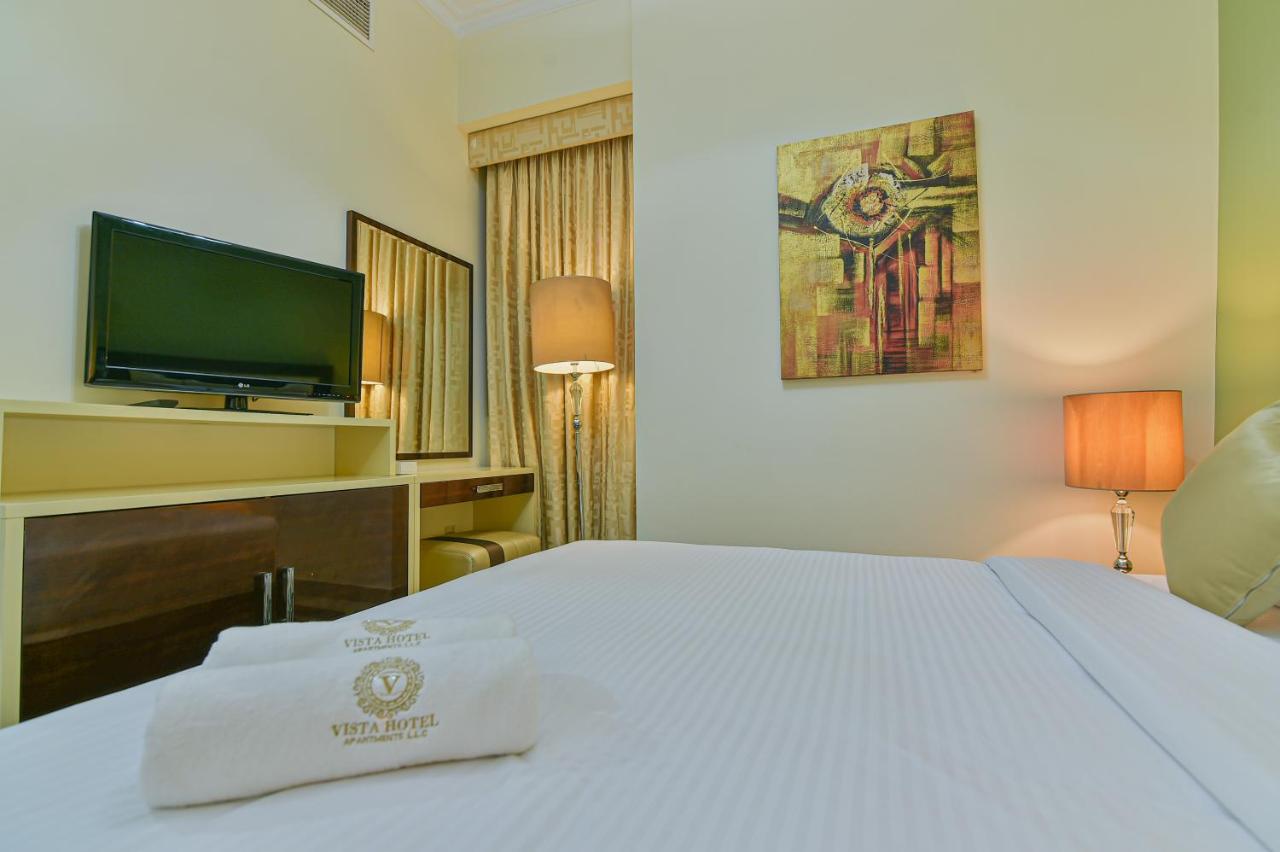 Vista Hotel Apartments Deluxe ドバイ エクステリア 写真